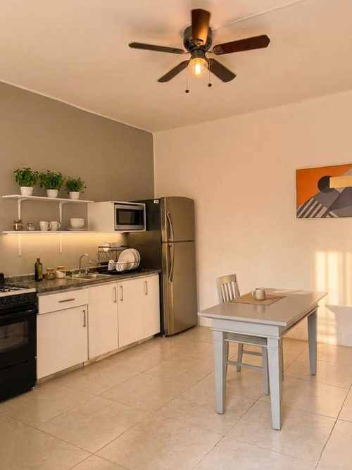 Cocina completa de María Jimena Suites